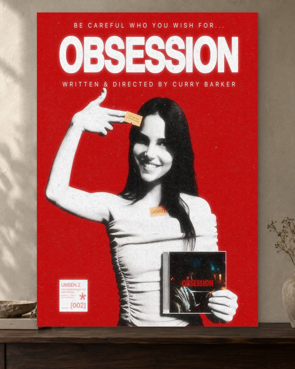 Obsession — Be Careful What You Wish For Poster — featured full-bleed poster mockup in the current warm greige room