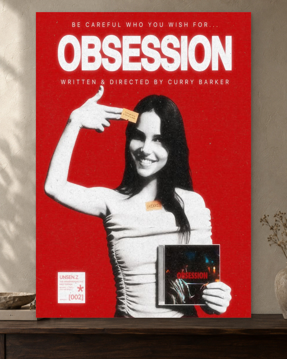 Obsession — Be Careful What You Wish For Poster — featured full-bleed poster mockup in the current warm greige room