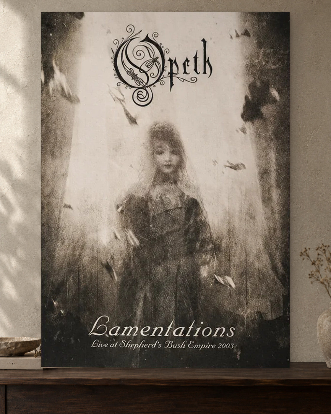 Opeth — Lamentations Poster poster artwork printed edge to edge on a warm neutral wall above a walnut console