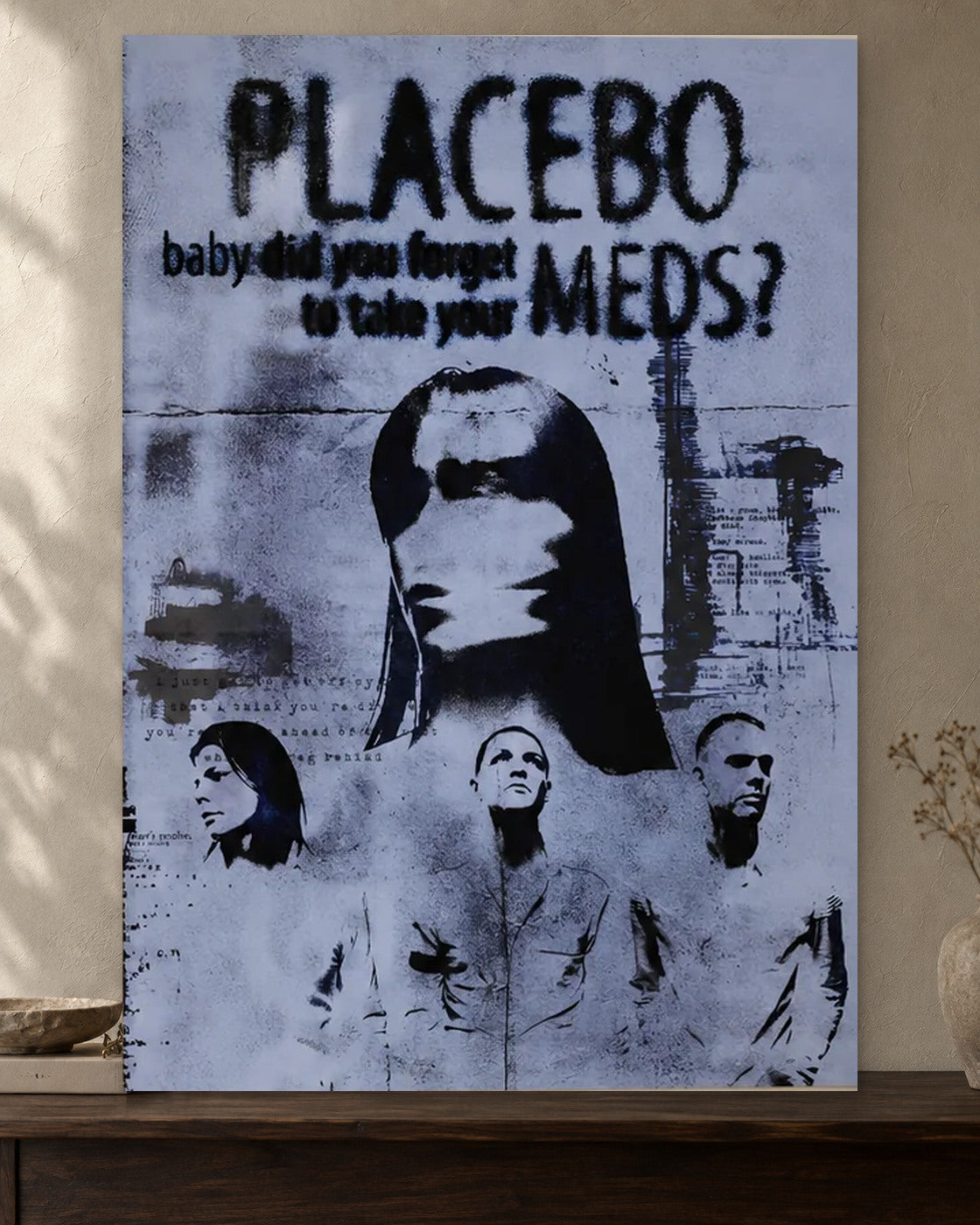 Placebo — Meds Poster poster artwork printed edge to edge on a warm neutral wall above a walnut console