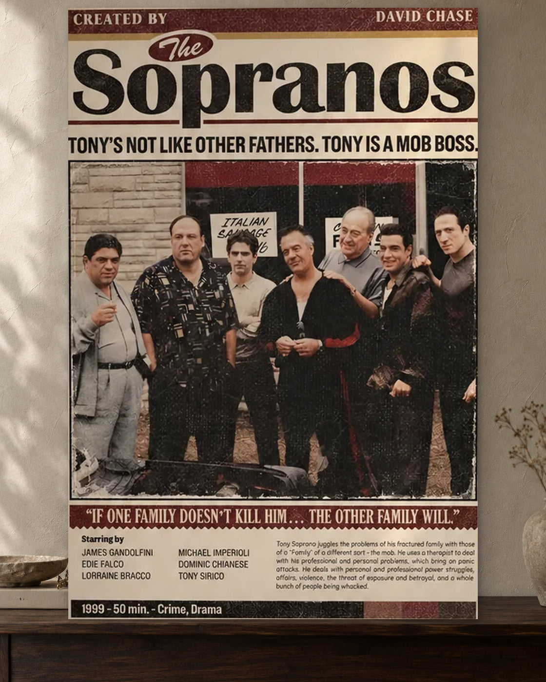 The Sopranos — Family Business Poster poster artwork printed edge to edge on a warm neutral wall above a walnut console